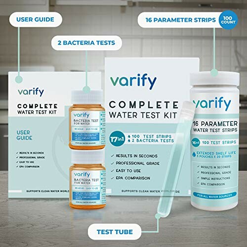 Complete water test kit with guide, bacteria tests, parameter strips, and test tube.