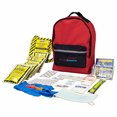 Emergency survival kit with backpack, food, water, and safety supplies.