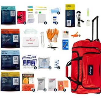 Emergency survival kit with first aid supplies, food, water, and tools in a red bag.