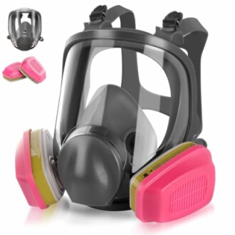 Full face respirator mask with pink filters.