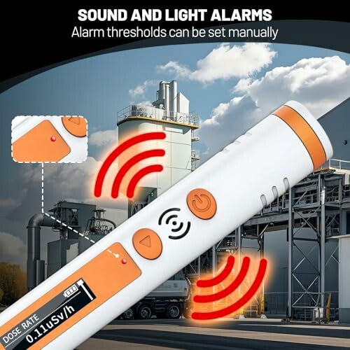 Radiation detector with sound and light alarms in an industrial setting.