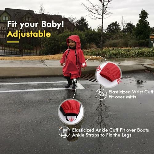 Toddler in red rain suit with adjustable cuffs outdoors.